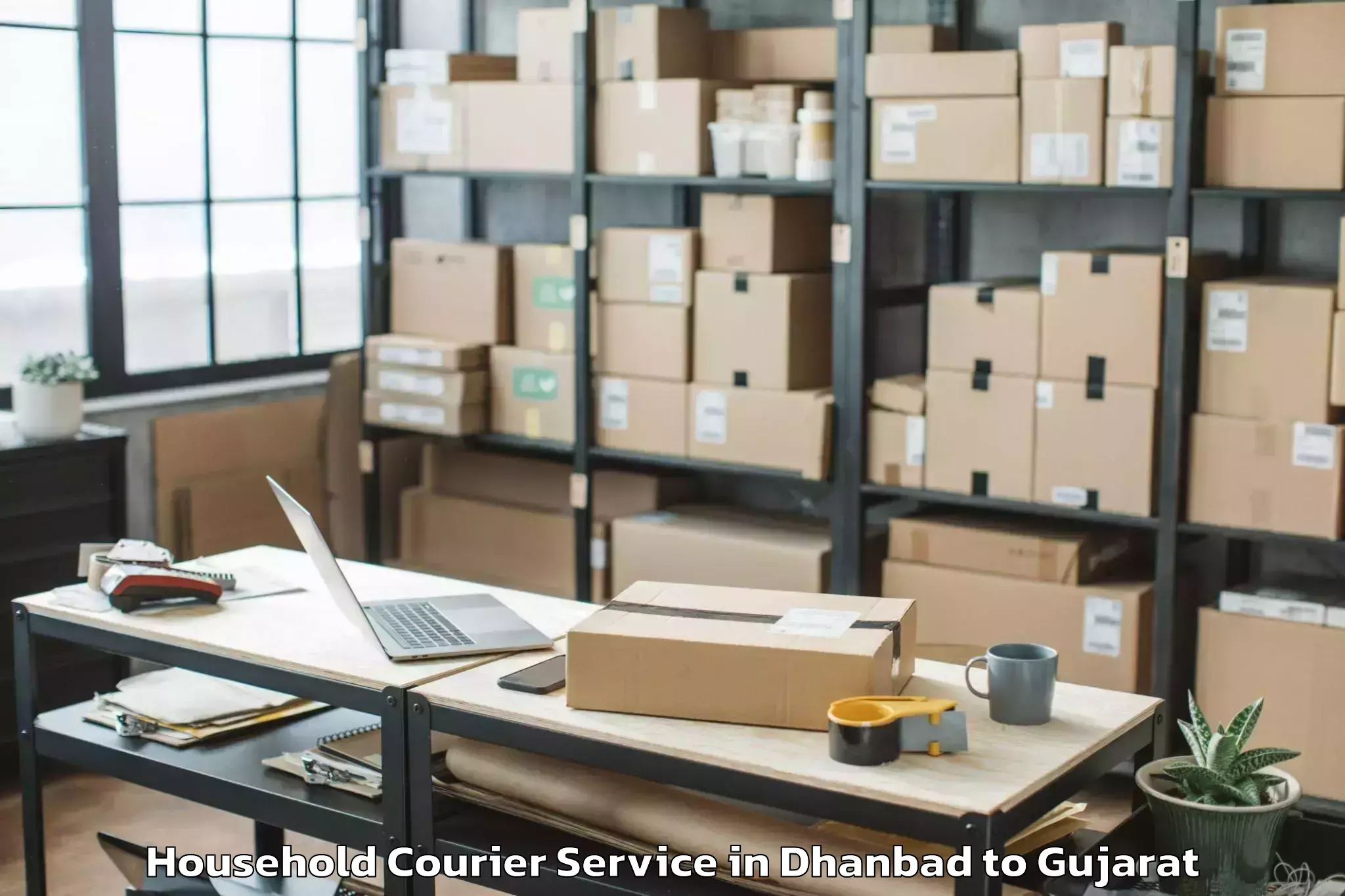 Reliable Dhanbad to Plastindia International Unive Household Courier